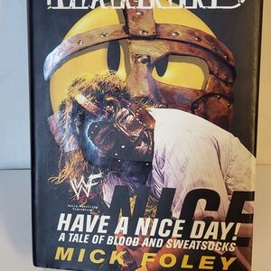 Mick Foley "Have a Nice Day!" Hardcover Book - Yellow & Black Cover